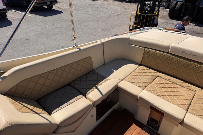  Yacht Photos Pics 2019 Chris-Craft Corsair 30 boat interior with beige quilted seating.