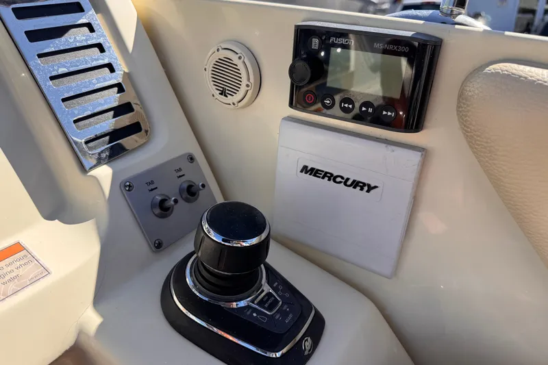  Yacht Photos Pics Control panel of 2019 Chris-Craft Corsair 30 boat with Mercury and Fusion systems.