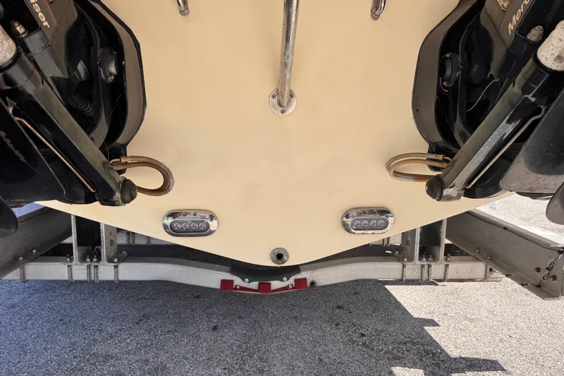  Yacht Photos Pics 2019 Chris-Craft Corsair 30 boat stern with dual outboard motors on trailer.