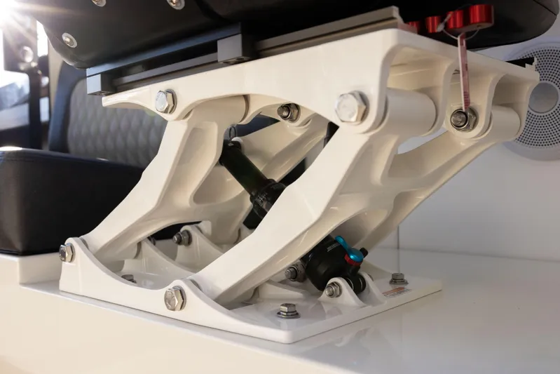 Jasper Marine Defender 22 Yacht Photos Pics 2025 Jasper Marine Defender 22 Storm Bow seat suspension mechanism, showcasing robust engineering and design.