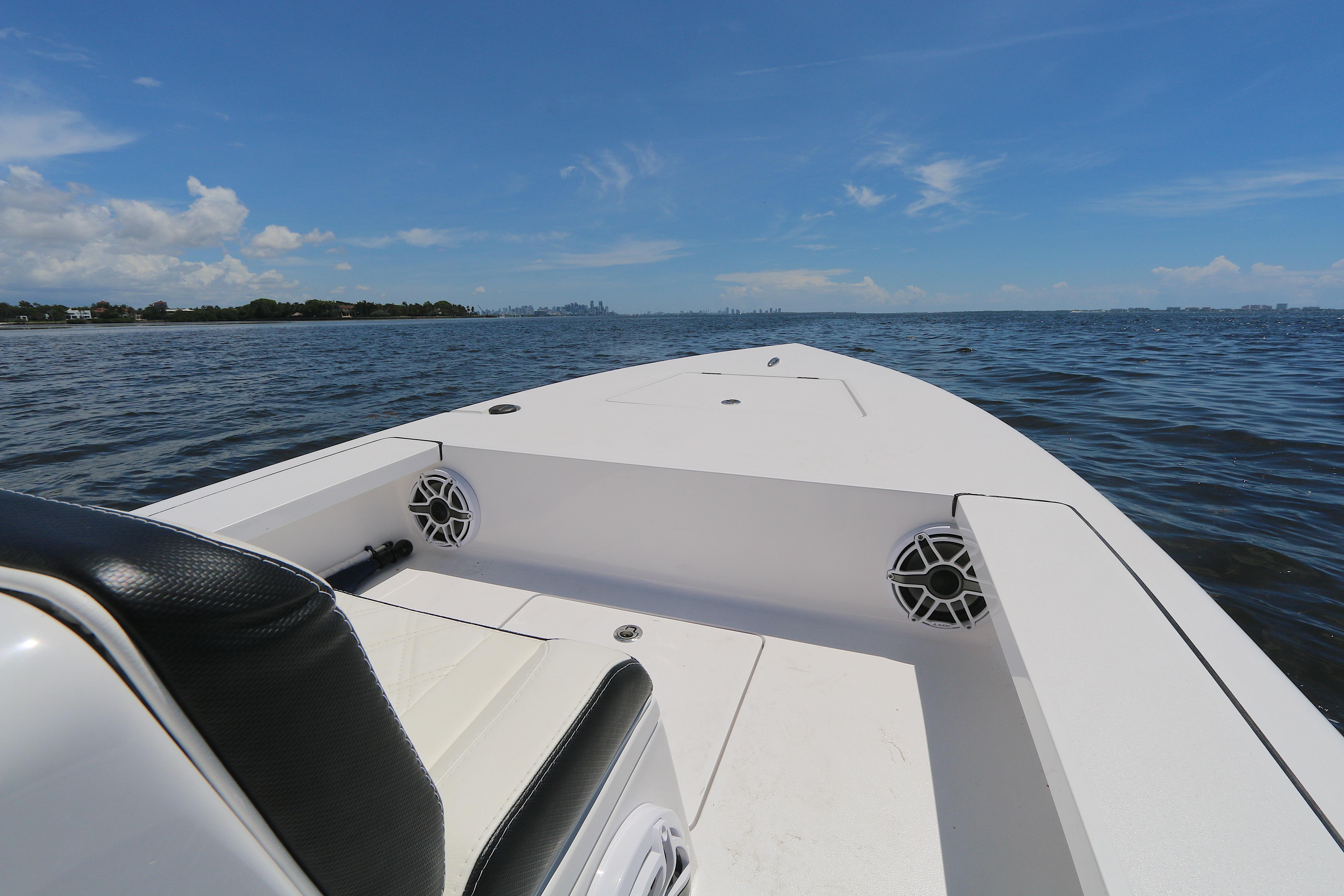 2024 Vtech 18 boat on open water under clear blue sky.