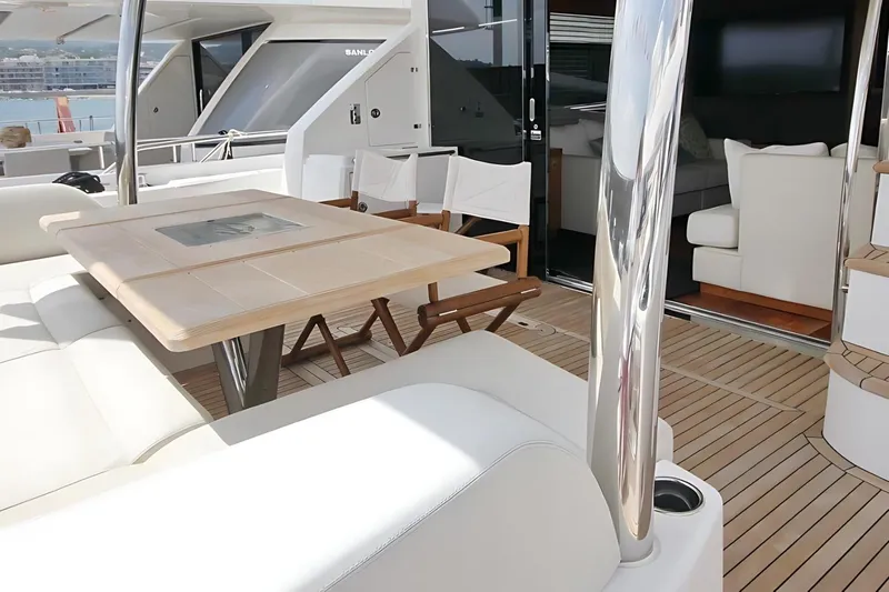 Sarahlisa Yacht Photos Pics Luxurious Sunseeker 75 yacht deck with elegant seating and dining area, 2015 model.