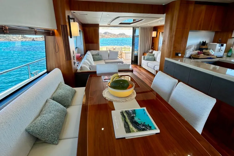 Sarahlisa Yacht Photos Pics Luxurious interior of 2015 Sunseeker 75 yacht with elegant dining and lounge area.