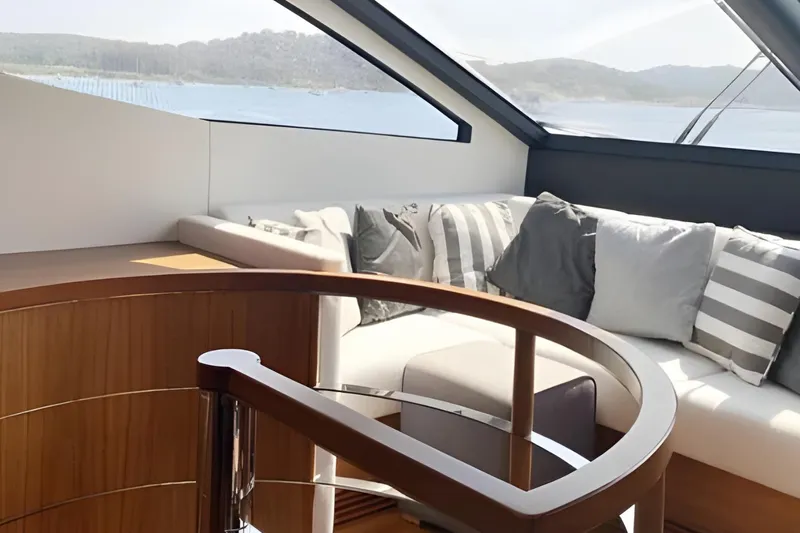 Sarahlisa Yacht Photos Pics Luxurious interior of 2015 Sunseeker 75 yacht with elegant seating and scenic views.