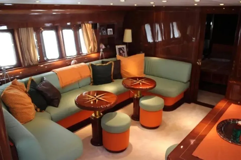  Yacht Photos Pics Luxurious interior of 2000 Cantieri dell'Arno Leopard 27 yacht with elegant seating and decor.