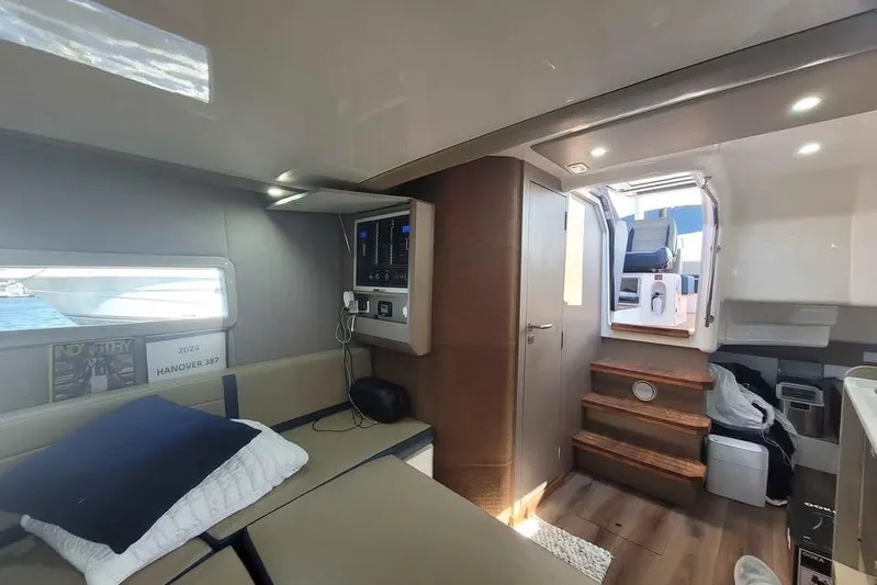  Yacht Photos Pics Interior of 2024 Hanover 387 yacht with modern design and comfortable seating.