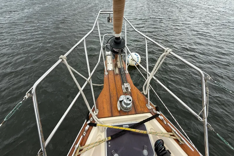 Pelican Yacht Photos Pics Bow view of 2008 Island Packet 370 sailboat on water.