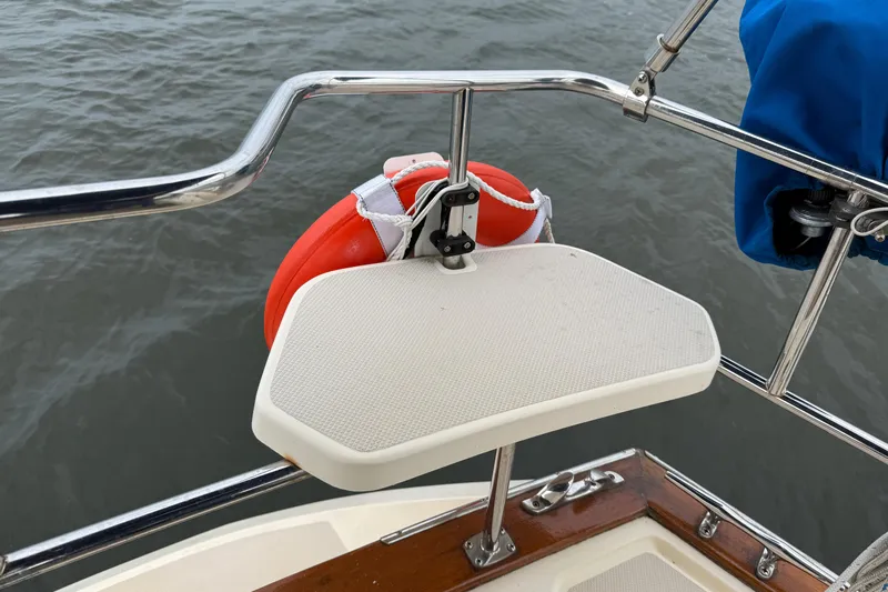 Pelican Yacht Photos Pics 2008 Island Packet 370 boat deck with safety equipment and railing.