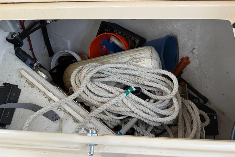 Pelican Yacht Photos Pics Storage compartment of 2008 Island Packet 370 sailboat with ropes and equipment.