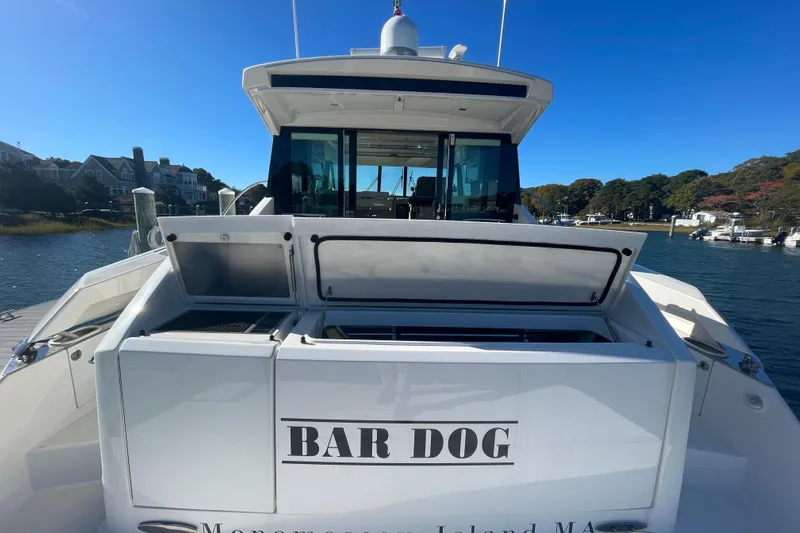Bar Dog Yacht Photos Pics Tiara 53C 2020 yacht "Bar Dog" docked at Manomassett Island, MA.