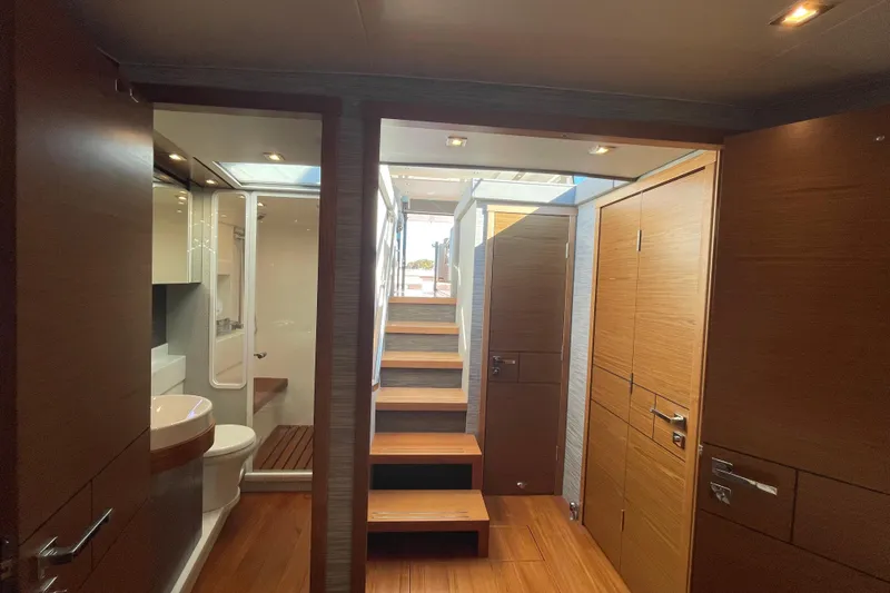 Bar Dog Yacht Photos Pics Luxurious interior of 2020 Tiara 53C yacht with wooden finishes and modern design.