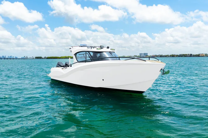  Yacht Photos Pics 2025 Novielli SERE boat on clear blue water under a sunny sky.