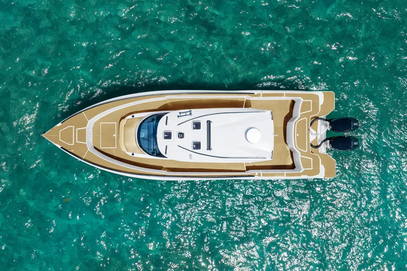  Yacht Photos Pics Aerial view of 2025 Novielli SERE yacht on turquoise water.