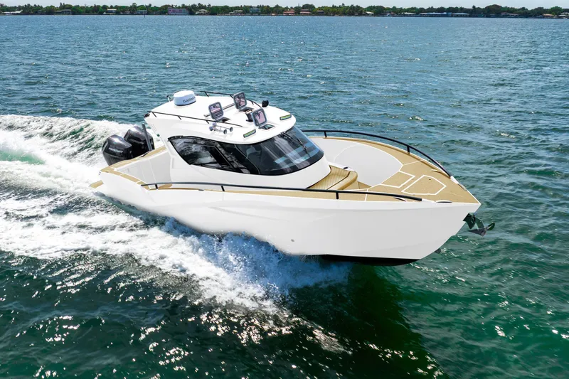  Yacht Photos Pics 2025 Novielli SERE boat cruising on open water, showcasing sleek design and modern features.