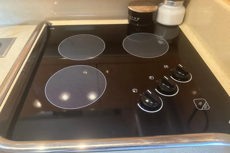 Bad Habit Yacht Photos Pics Electric stovetop in 1998 Sea Ray 450 Sundancer yacht kitchen.