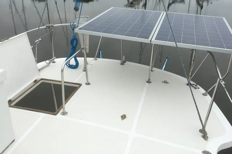  Yacht Photos Pics 1997 Willard Marine 40 Pilothouse Trawler deck with solar panels and railing.