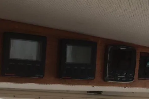  Yacht Photos Pics Control panel of a 1997 Willard Marine 40 Pilothouse Trawler with navigation instruments.