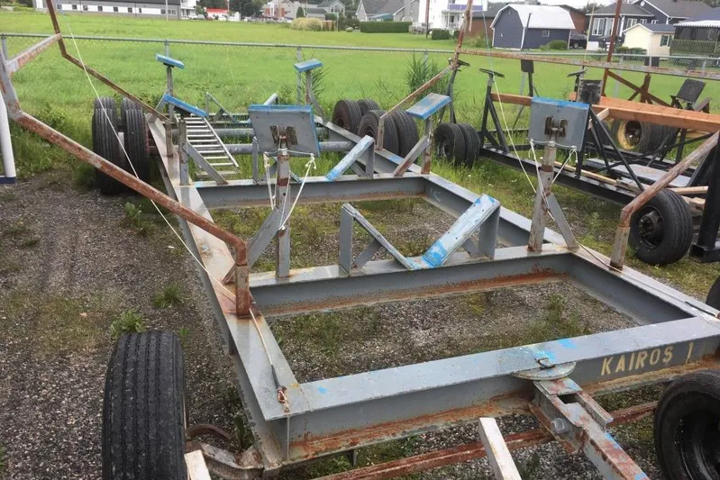  Yacht Photos Pics Rusty boat trailer for 1997 Willard Marine 40 Pilothouse Trawler on gravel.