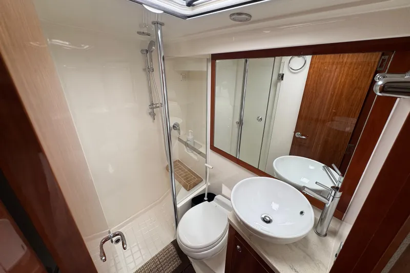  Yacht Photos Pics Luxurious bathroom in 2016 Riviera 43 Open Flybridge yacht with modern fixtures.