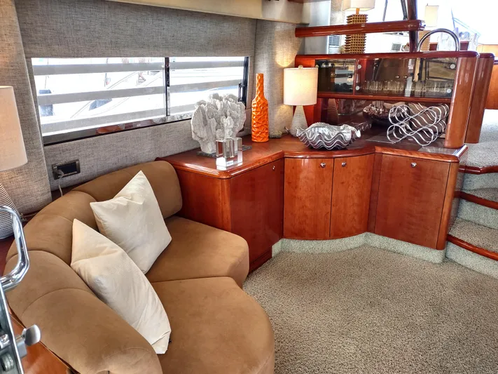 F66 Yacht Photos Pics Luxurious interior of a 1997 Fairline 66 yacht with elegant decor and comfortable seating.