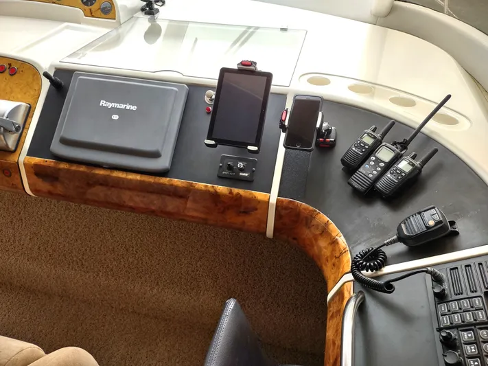 F66 Yacht Photos Pics Control panel of a 1997 Fairline 66 yacht with navigation and communication devices.