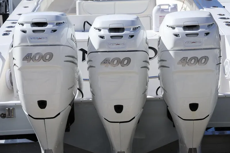  Yacht Photos Pics Triple 400 horsepower outboard engines on a 2005 Venture 39 Open boat.