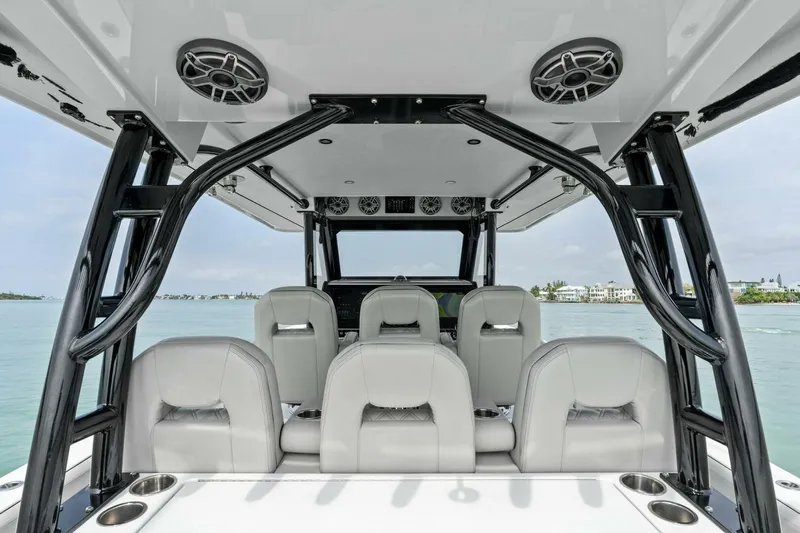  Yacht Photos Pics 2022 Barker Boatworks 40 High Performance Cat interior with sleek seating and modern design.