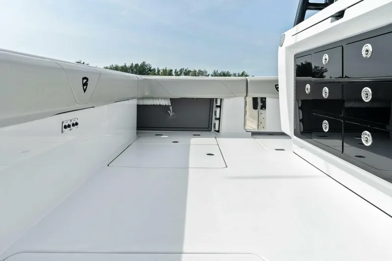  Yacht Photos Pics 2022 Barker Boatworks 40 High Performance Cat interior, sleek design with ample storage.