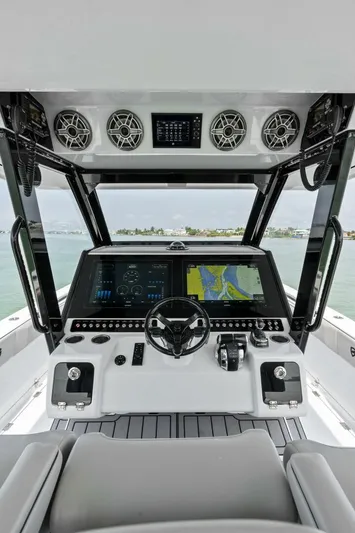  Yacht Photos Pics 2022 Barker Boatworks 40 High Performance Cat cockpit with advanced navigation system and controls.