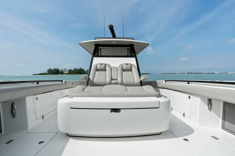  Yacht Photos Pics 2022 Barker Boatworks 40 High Performance Cat, luxury seating, open deck, ocean backdrop.
