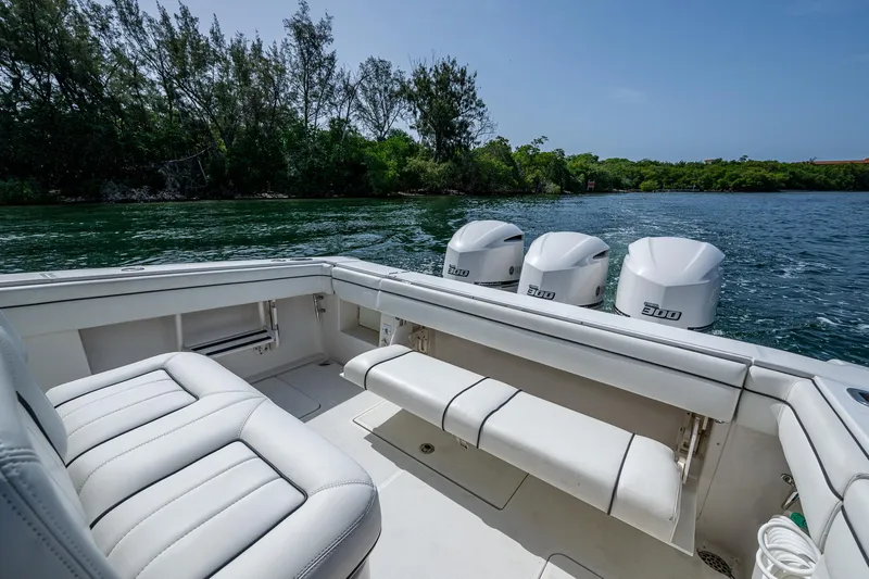 Naider's Yacht Photos Pics 2016 Jupiter 34 LX boat with triple engines on a scenic waterway.