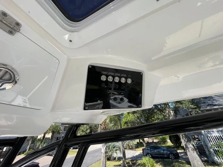  Yacht Photos Pics 2024 Sea Fox 288 Commander boat interior with control panel and overhead view.