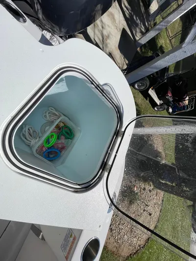  Yacht Photos Pics 2024 Sea Fox 288 Commander storage compartment with ropes and accessories.