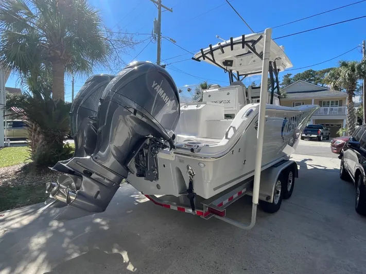  Yacht Photos Pics 2024 Sea Fox 288 Commander boat with dual Yamaha engines on a trailer.