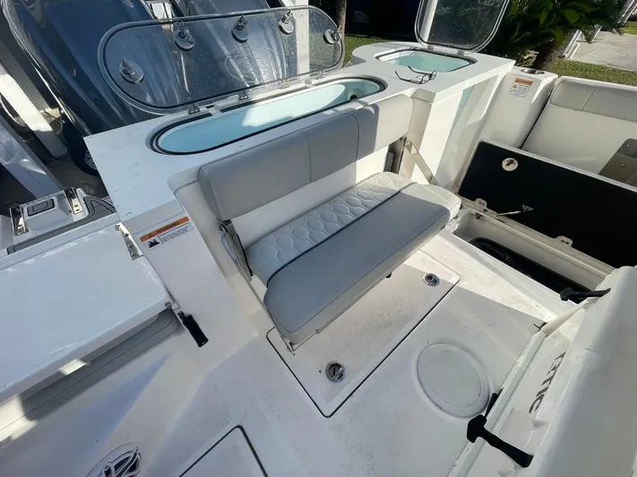  Yacht Photos Pics 2024 Sea Fox 288 Commander boat interior with seating and storage compartments.