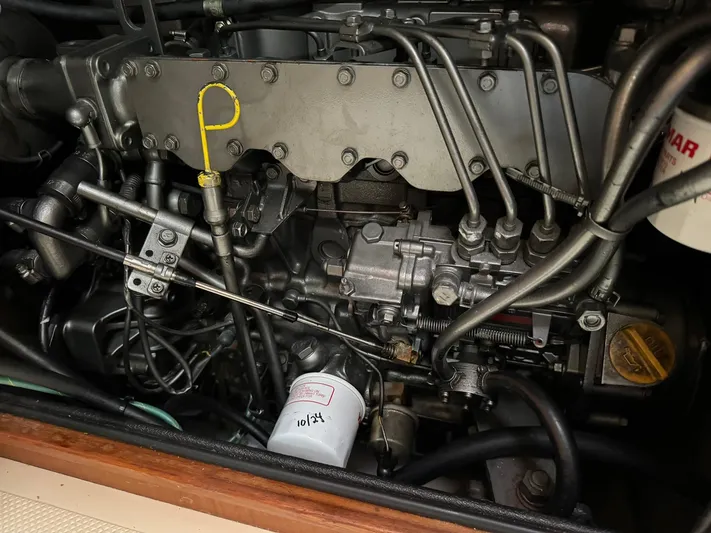 Essence Yacht Photos Pics Engine of a 1998 Island Packet 40 sailboat, showcasing mechanical components.