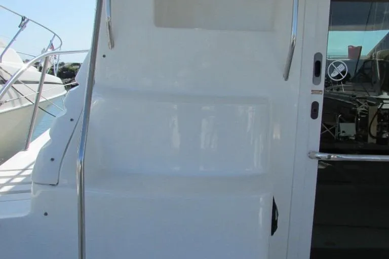  Yacht Photos Pics Staircase and door on 2000 Sea Ray 400 Sedan Bridge yacht.