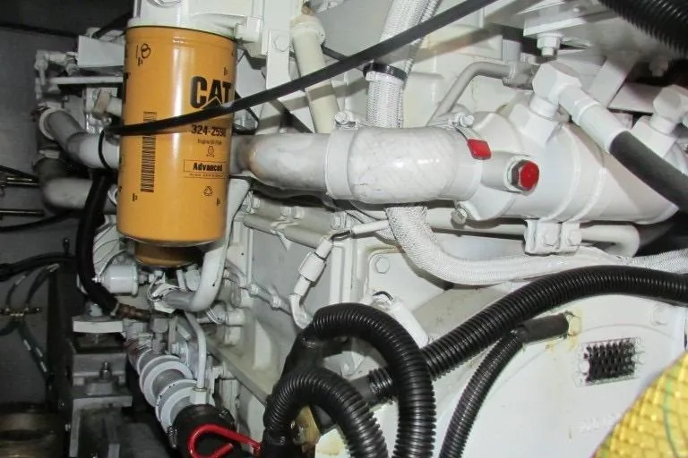  Yacht Photos Pics Engine compartment of a 2000 Sea Ray 400 Sedan Bridge with visible CAT filter.