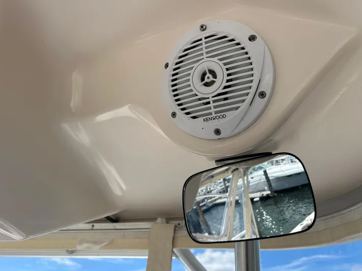 She Bot It II Yacht Photos Pics Kenwood speaker and mirror on 2007 Grady-White Express 305 boat interior.