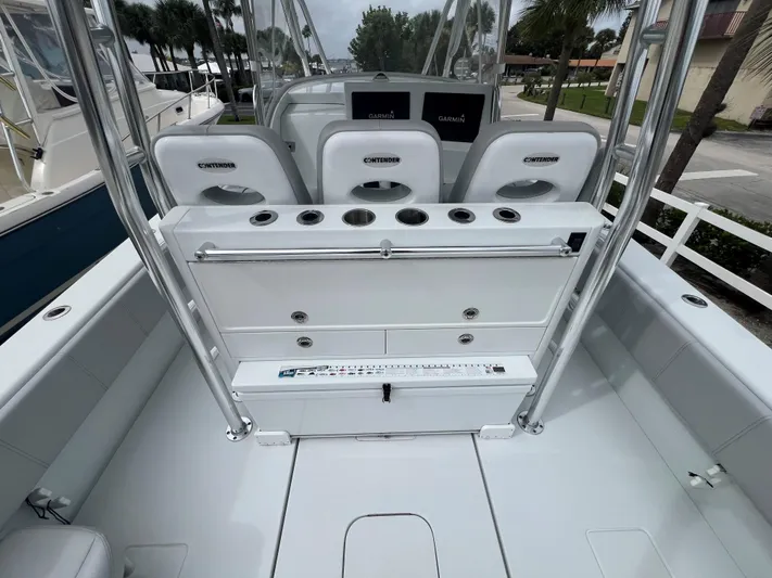 No Name Yacht Photos Pics 2022 Contender 39 Fisharound boat interior with seating and fishing rod holders.