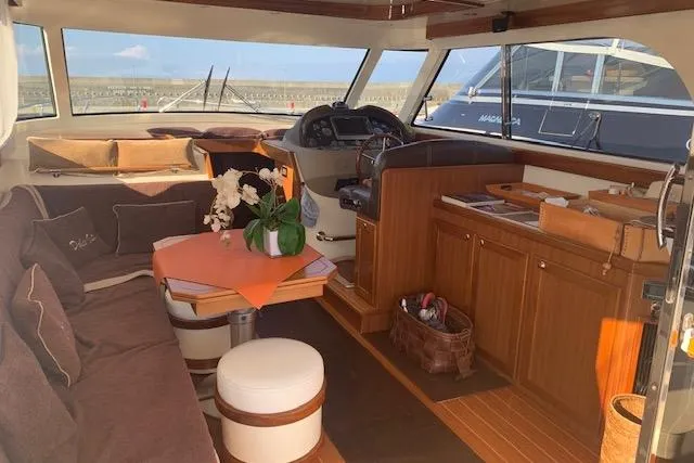  Yacht Photos Pics Luxurious interior of a 2007 Apreamare 48 yacht with elegant wood finishes.