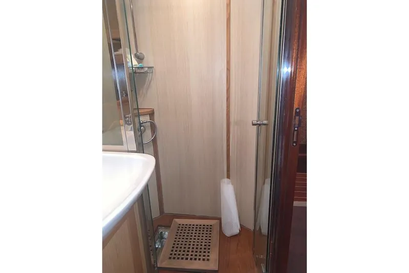  Yacht Photos Pics 2007 Apreamare 48 yacht bathroom with wooden shower floor and glass door.
