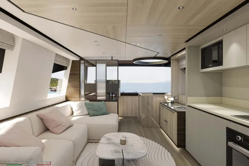  Yacht Photos Pics Luxurious interior of 2025 MandaYachts S7 BERLINETTA with modern kitchen and cozy seating area.