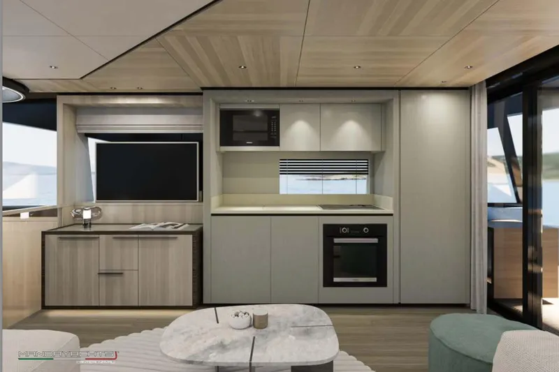  Yacht Photos Pics Modern kitchen interior of 2025 MandaYachts S7 BERLINETTA with sleek cabinetry and appliances.