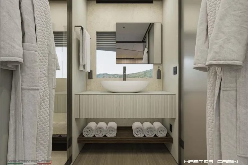  Yacht Photos Pics Luxurious master cabin bathroom in 2025 MandaYachts S7 BERLINETTA, featuring modern sink and plush robes.