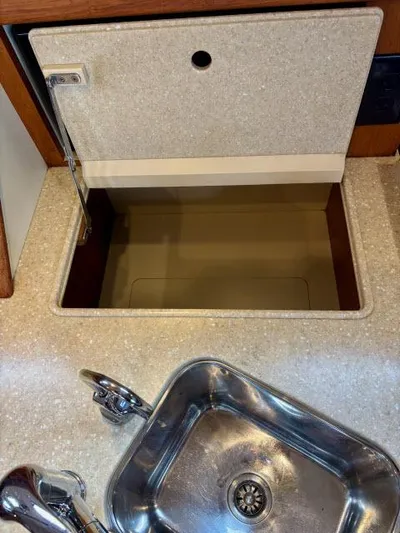 Pelican Yacht Photos Pics 2008 Island Packet 370 yacht kitchen sink and storage compartment.