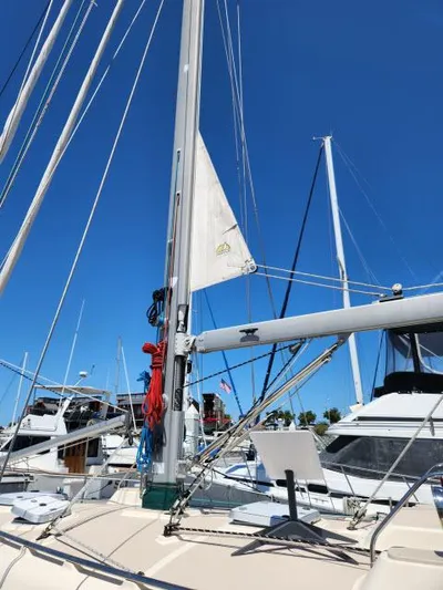 Pelican Yacht Photos Pics Sailboat Island Packet 370, 2008 model, docked with clear blue sky background.
