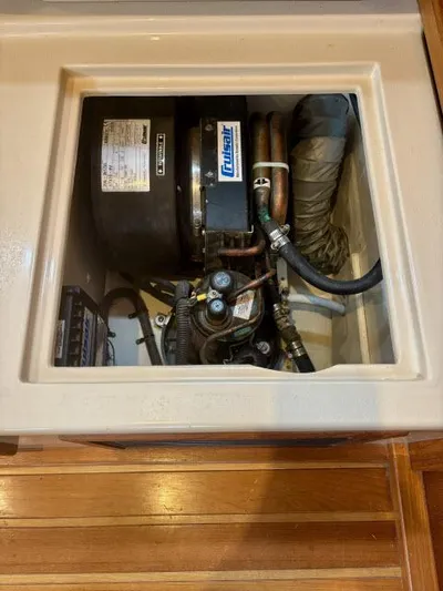 Pelican Yacht Photos Pics Engine compartment of 2008 Island Packet 370 sailboat, featuring a Fischer Panda generator.