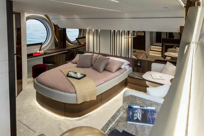  Yacht Photos Pics Luxurious bedroom interior of 2024 Aicon Vivere 66' yacht with modern design and ocean view.