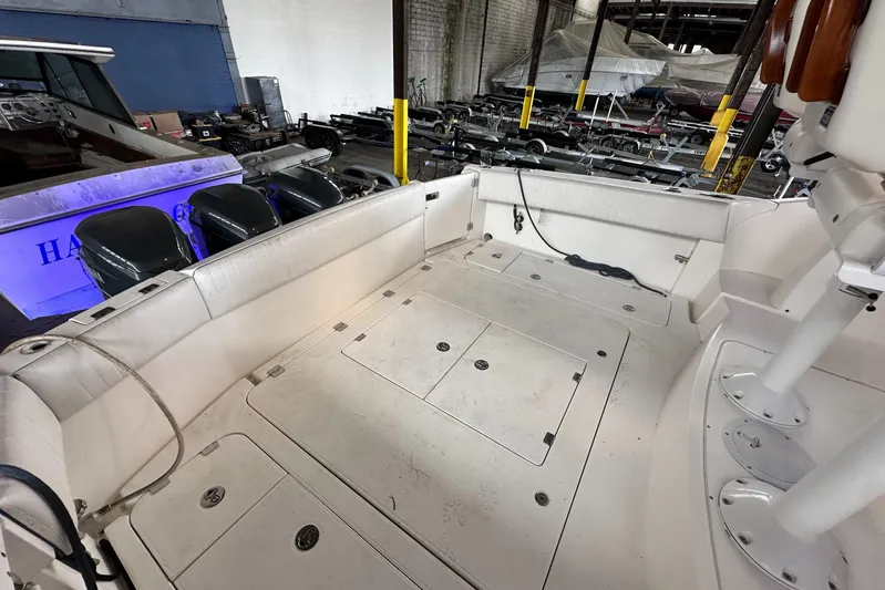  Yacht Photos Pics 2006 Sunseeker Sportfisher 37 boat interior with storage compartments and seating.